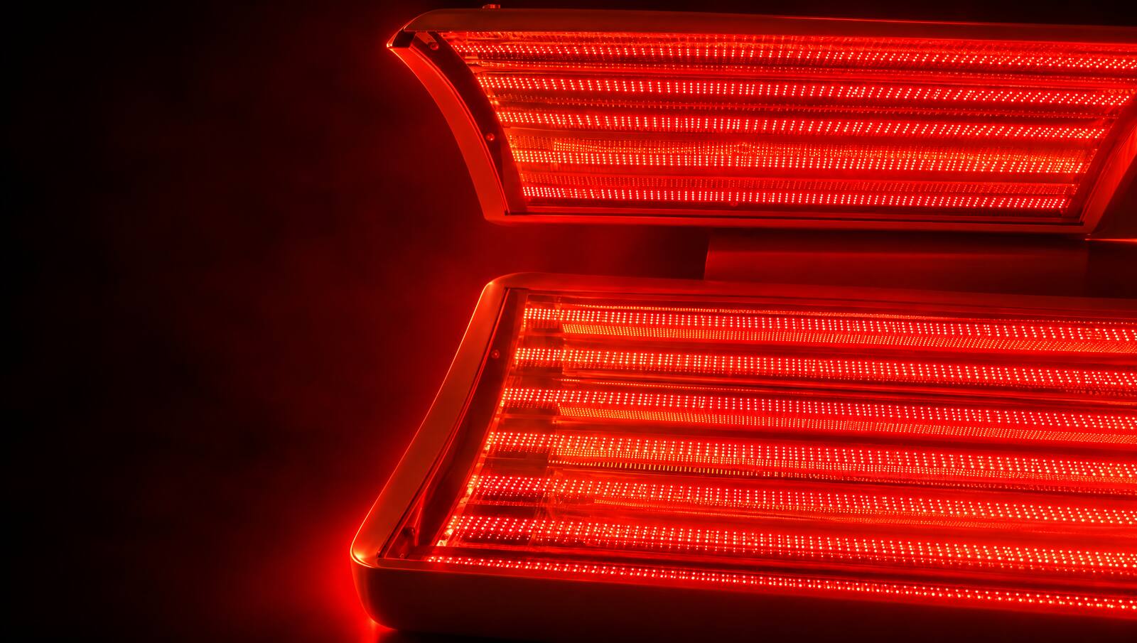 The Prism Light Pod's canopy and bed glowing bright red